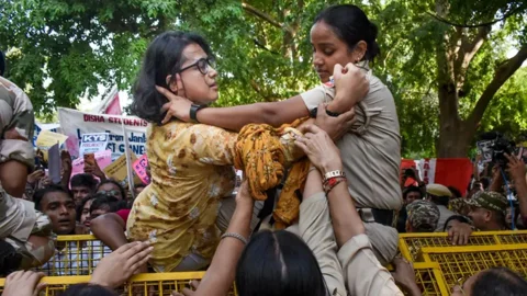 অভিজিতের পর এবার আটক নেহা বোরাও