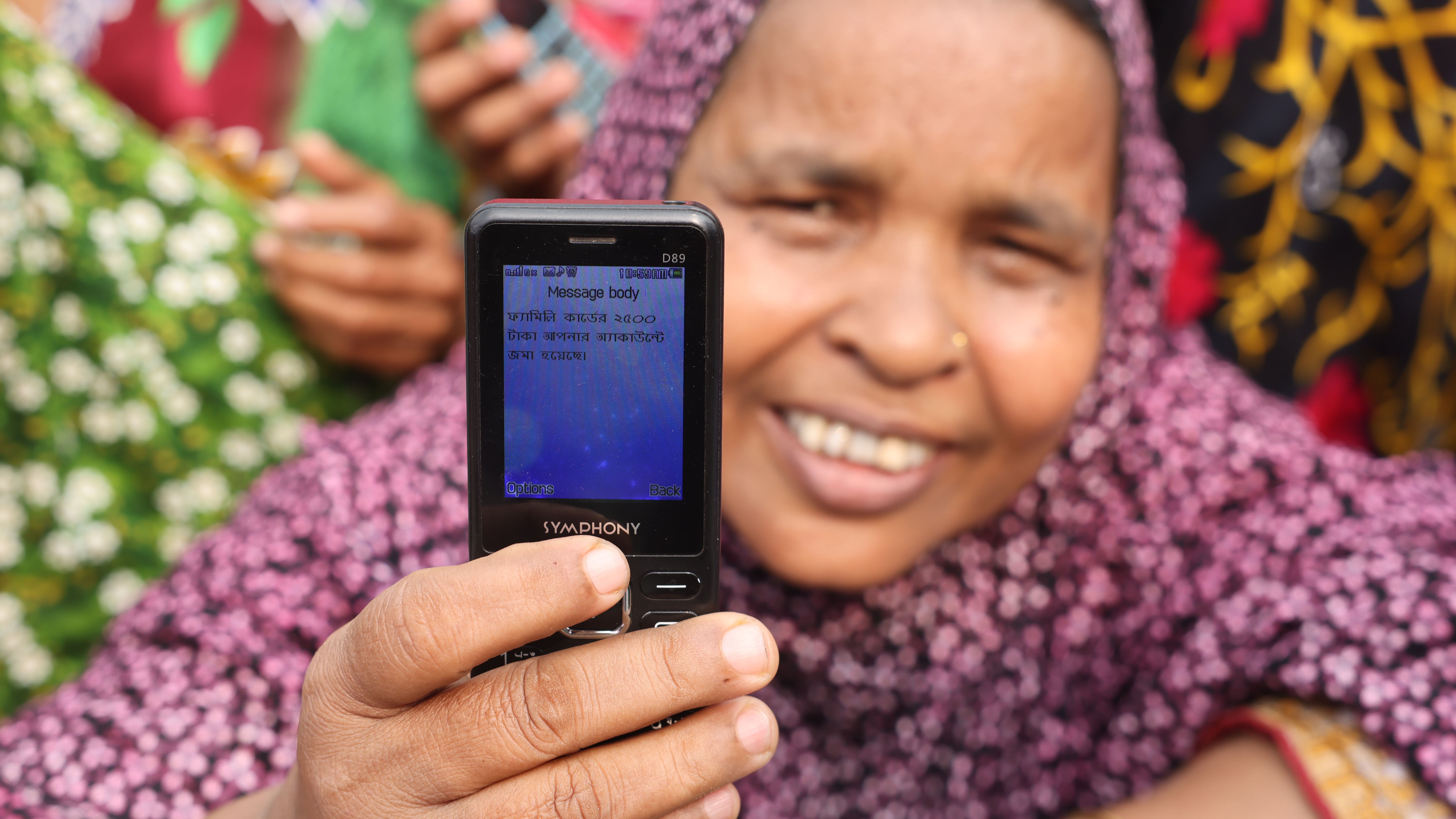 হাতে ফ্যামিলি কার্ড মুখে হাসি